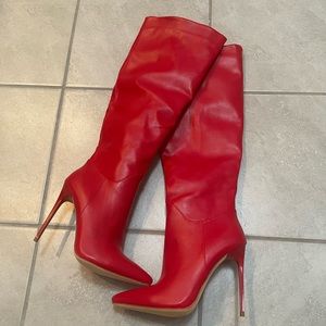 Red stiletto knee boots